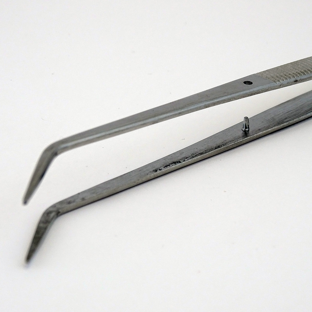 Tweezers angled 150mm